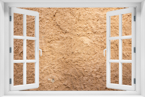 Fototapeta Naklejka Na Ścianę Okno 3D - Dry brown mud plaster wall floor background texture. Empty soil ground, blank backdrop. Copy space.