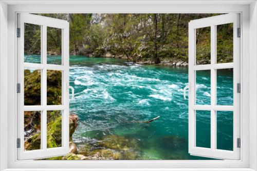 Fototapeta Naklejka Na Ścianę Okno 3D - Beautiful green river flowing in nature. 