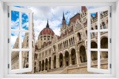 Fototapeta Naklejka Na Ścianę Okno 3D - The building of Hungarian Parliament on a sunny day of March