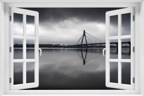 Fototapeta Naklejka Na Ścianę Okno 3D - Black and white cityscape. North Bridge in Kyiv in the reflection of the Dnieper