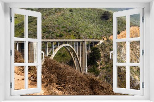 Fototapeta Naklejka Na Ścianę Okno 3D - Bixby Creek Bridge, also known as Bixby Canyon Bridge, is on the Big Sur coast of California, USA. It is a reinforced concrete open-spandrel arch bridge.