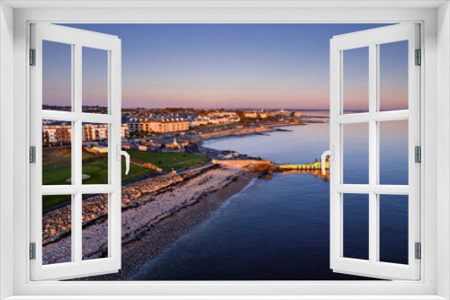 Fototapeta Naklejka Na Ścianę Okno 3D - Popular Blackrock diving board and Salthill area of Galway city, Ireland. Popular city landmark and water sport area. Tourist attraction with high end hotels and amusement park.
