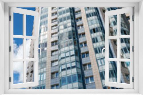 Multi-storey apartment building with many windows