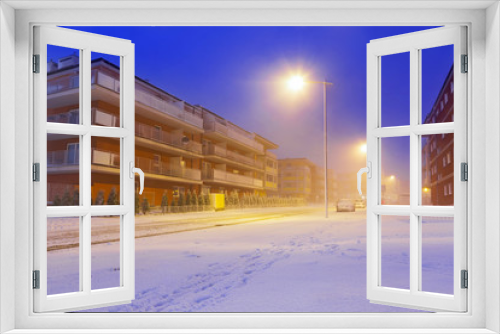 Fototapeta Naklejka Na Ścianę Okno 3D - Snowy street at winter in Poland