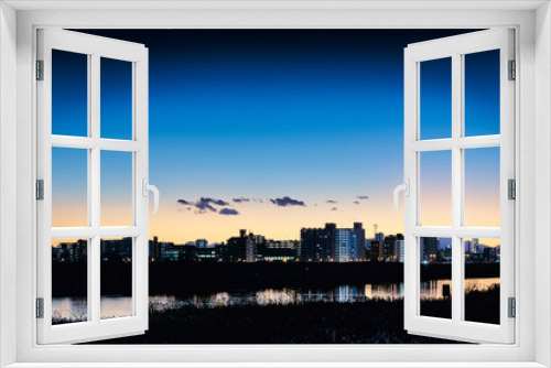 Fototapeta Naklejka Na Ścianę Okno 3D - 荒川河川敷から見た東京郊外の夕方の足立区の風景