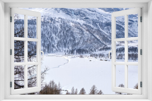 Fototapeta Naklejka Na Ścianę Okno 3D - Canton Graubunden, Switzerland : Landscape in Alp Grum train station (Bernina express) during winter season
