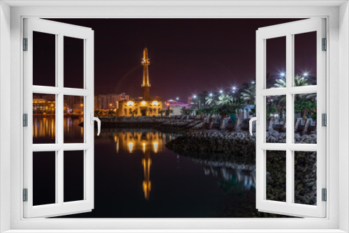 Fototapeta Naklejka Na Ścianę Okno 3D - Hanan Kanoo Mosque in the evening lights on the shore of Persian Gulf, Manama, Bahrain