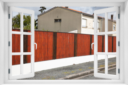 Fototapeta Naklejka Na Ścianę Okno 3D - brown wooden high fence private house suburb wood protect long visual protection barrier