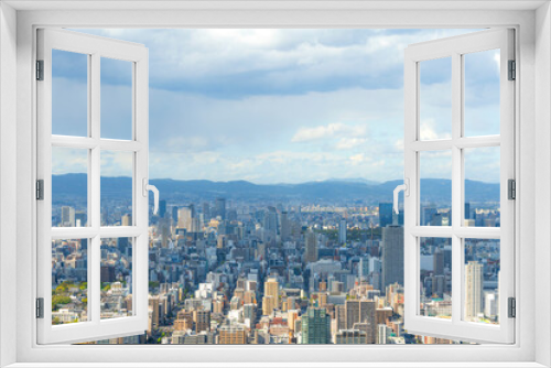 Fototapeta Naklejka Na Ścianę Okno 3D - 大阪の街並みと曇り空
