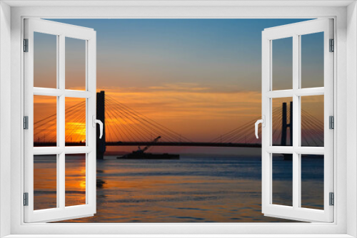 Fototapeta Naklejka Na Ścianę Okno 3D - golden gate bridge at sunset
An orange sunset view with the silhouette of a bridge in the middle of the sea