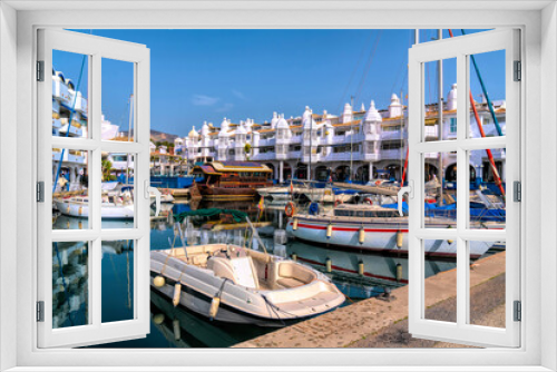 Fototapeta Naklejka Na Ścianę Okno 3D - Benalmadena marina Spain with boats and yachts restaurants and apartments luxury Costa del Sol destination