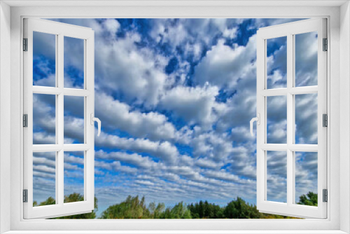 Fototapeta Naklejka Na Ścianę Okno 3D - Stripes of clouds just above nature