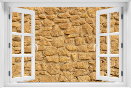 Fototapeta Naklejka Na Ścianę Okno 3D - Texture of a stone wall. Old castle stone wall texture background. Stone wall as a background or texture. Part of a stone wall, for background or texture