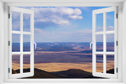 Fototapeta Naklejka Na Ścianę Okno 3D - Aerial view of scenic mountains and valleys in spring from mountain peak