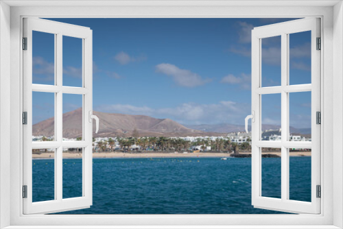 Fototapeta Naklejka Na Ścianę Okno 3D - View on Costa Teguise town from the water, Lanzarote, Canary Islands