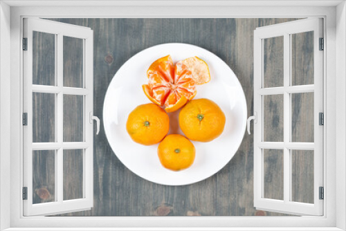 Fototapeta Naklejka Na Ścianę Okno 3D - Top view fresh sliced orange on dark background ripe mellow fruit juice color citrus tree citrus, Whole and sliced ripe oranges placed on marble background, half orange fruit.