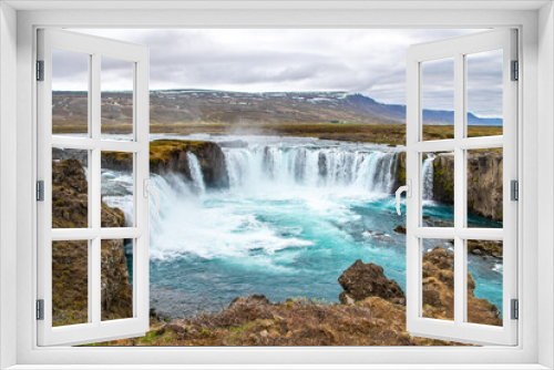 Fototapeta Naklejka Na Ścianę Okno 3D - Majestic Goðafoss: A Stunning Icelandic Waterfall in Winter