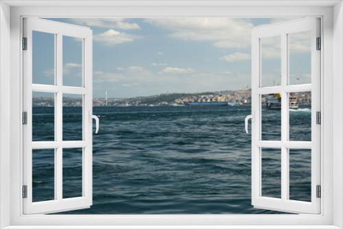 Fototapeta Naklejka Na Ścianę Okno 3D - View from a boat to Istanbul bosporus on a sunny day