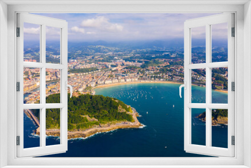 Aerial panoramic view of summer seascape with La Concha Bay and coastal city of San Sebastian, Basque Country, Spain..