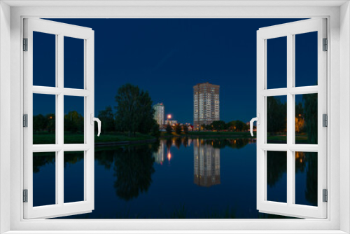 Fototapeta Naklejka Na Ścianę Okno 3D - Late evening at city riverside