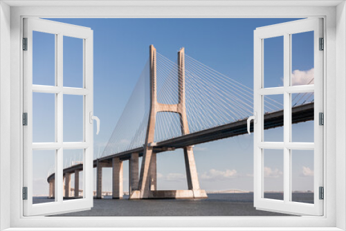 Fototapeta Naklejka Na Ścianę Okno 3D - The Vasco da Gama Bridge in Lisbon, Portugal. Cable-stayed bridge. Tagus river. 
