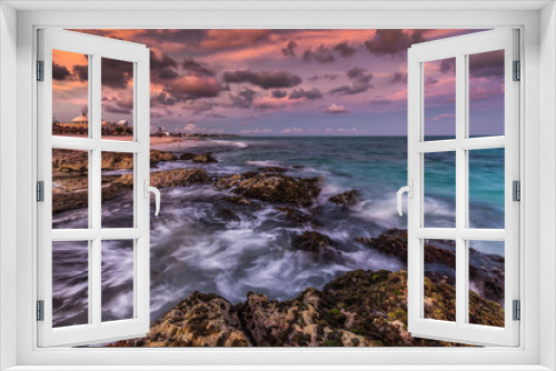 Fototapeta Naklejka Na Ścianę Okno 3D - Purple sunset over a tropical rocky beach