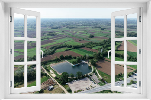 Fototapeta Naklejka Na Ścianę Okno 3D - Lazarevac, Kolubara district of Serbia. Drone view of the city on a sunny day