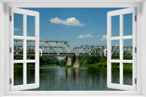 Fototapeta Naklejka Na Ścianę Okno 3D - Railway bridge over the river