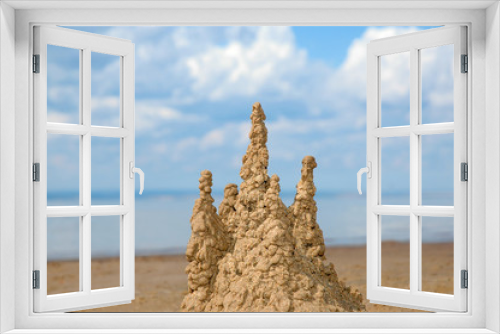 Fototapeta Naklejka Na Ścianę Okno 3D - Sand castle on the beach