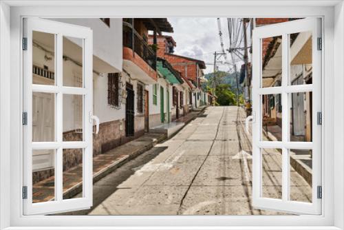 Fototapeta Naklejka Na Ścianę Okno 3D - Narrow street in the old town Santa Elena Colombia | Medellin Colombia 