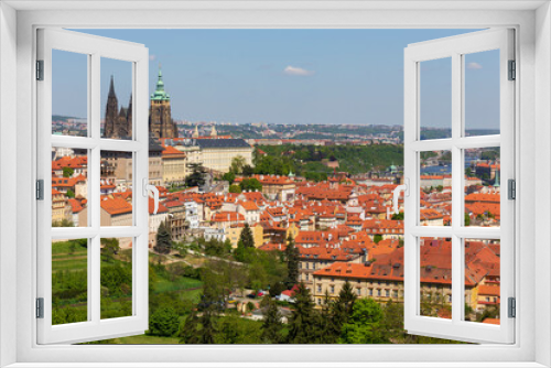 Fototapeta Naklejka Na Ścianę Okno 3D - Spring Prague City with gothic Castle and the colorful Nature with flowering Meadows from the Hill Petrin, Czech Republic