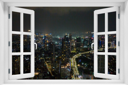 Fototapeta Naklejka Na Ścianę Okno 3D - Jakarta with skyscrapers and the illumination of the night.