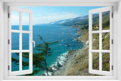Fototapeta Naklejka Na Ścianę Okno 3D - Panoramic view of the rugged coastline of Big Sur with Santa Lucia Mountains along famous Highway 1, Monterey county, California, USA, America. Road trip on overcast summer day at seaside.