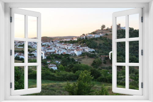 Fototapeta Naklejka Na Ścianę Okno 3D - Cortegana, Huelva, Spain, May 12, 2023: View of the magical Andalusian town of Cortegana, Huelva, Spain with the castle on top