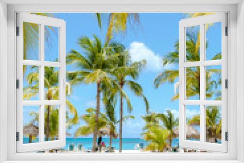 Fototapeta Naklejka Na Ścianę Okno 3D - Palm Beach Aruba Caribbean, white long sandy beach with palm trees and a blue ocean at Aruba Antilles.