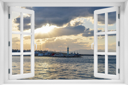 Fototapeta Naklejka Na Ścianę Okno 3D - Cesme harbor lighthouse at sunset (Izmir province, Turkiye)