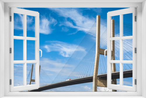 Fototapeta Naklejka Na Ścianę Okno 3D - Alex Fraser Bridge on a sunny day. Taken in North Delta, Greater Vancouver Canada. Modern bridge pylon against blue sky