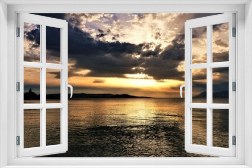 Fototapeta Naklejka Na Ścianę Okno 3D - Sunset above the sea with dramatic clods