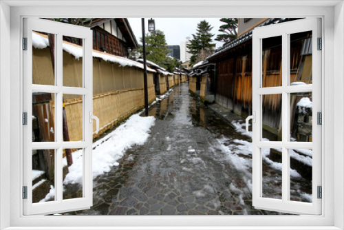 Fototapeta Naklejka Na Ścianę Okno 3D - A historic street with samurai residences in Kanazawa, Japan in winter