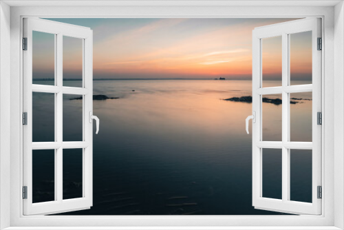 Fototapeta Naklejka Na Ścianę Okno 3D - A calm sunset by the sea