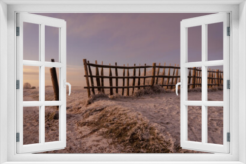 Fototapeta Naklejka Na Ścianę Okno 3D - A Clent Hills Worcestershire winter scene with cold wooden fence