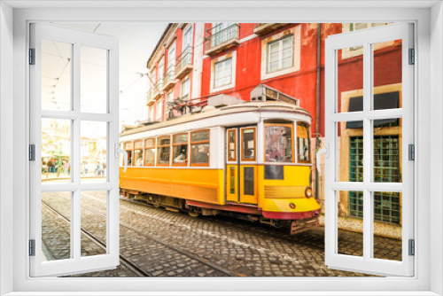 Fototapeta Naklejka Na Ścianę Okno 3D - tram on narrow street of Alfama, Lisbon
