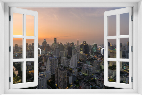 Fototapeta Naklejka Na Ścianę Okno 3D - Scenery cityscape of Illuminated Bangkok city metropolis in twilight. Panoramic skyline urban panorama of modern city on dusk. High-angle view