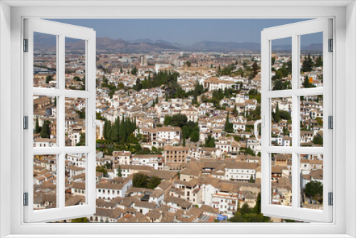 Architectural details of the Alhambra fortified palace complex and Granada city