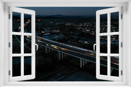 Fototapeta Naklejka Na Ścianę Okno 3D - high angle view of traffic on highway bridge at night