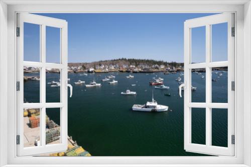 Fototapeta Naklejka Na Ścianę Okno 3D - The colorful and quaint working harbor on Vinalhaven Island in Maine