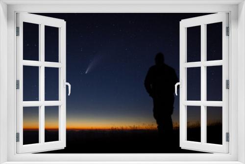 Fototapeta Naklejka Na Ścianę Okno 3D - Neowise Comet silhouette of a person