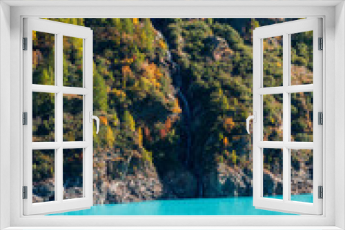Fototapeta Naklejka Na Ścianę Okno 3D - Autumnal landscape of the Lake Place Moulin, an artificial glacial lake with turquoise water in the italian Alps,  on the border with Switzerland
