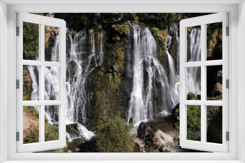 Fototapeta Naklejka Na Ścianę Okno 3D - Long exposure shot of Shaki waterfall on sunny summer day. Syunik Province, Armenia.