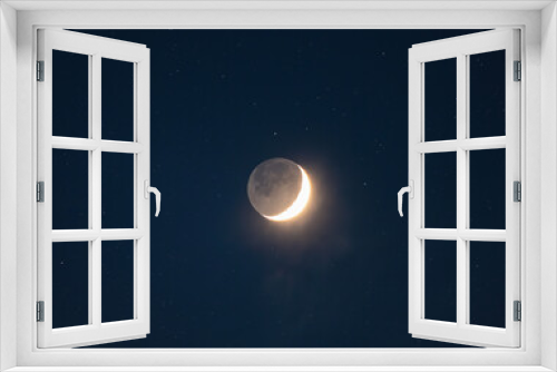 Fototapeta Naklejka Na Ścianę Okno 3D - Crescent Moon with Planetshine and stars (collage) in the night sky, photo taken through a telephoto lens